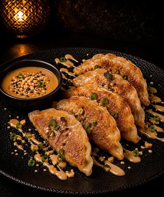 The pork dumplings with their dipping sauce